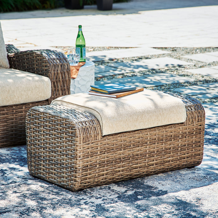 Ashley Express - Sandy Bloom Outdoor Lounge Chair and Ottoman